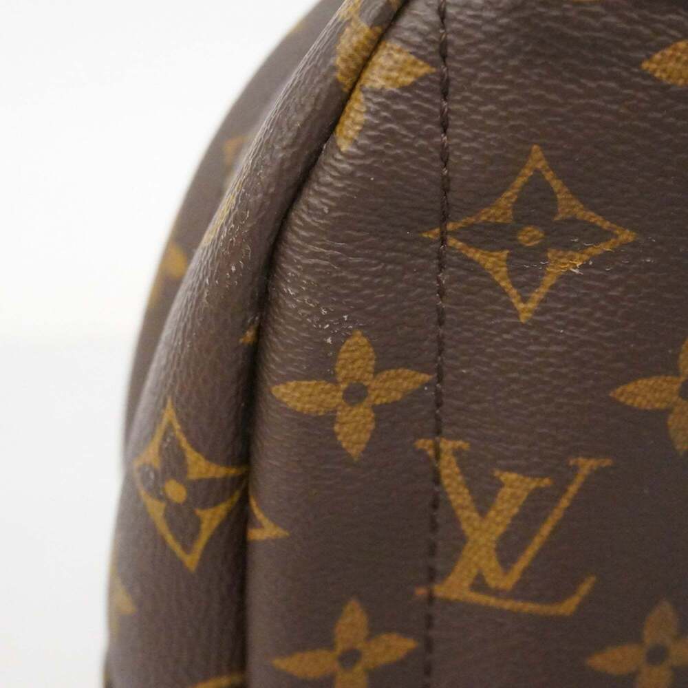 LOUIS VUITTON Brown Monogram Backpack - Picture 12 of 16